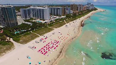 Miami Beach scene aerial panning from ocean to coast