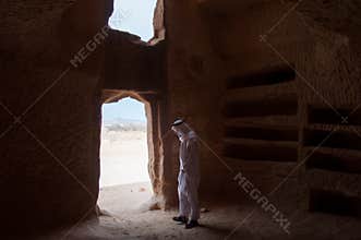 Saudian inside a Nabatean tomb in Madaîn Saleh archeological si