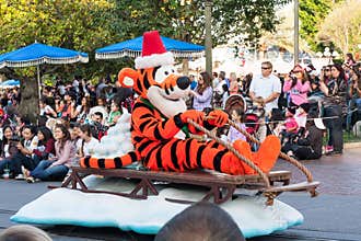 Tigger (Winnie the Pooh's friend) rides a sleigh in Disneyland Parade