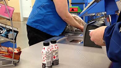 One side of check out counter inside Walmart store