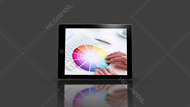 Media device screens showing designers at work