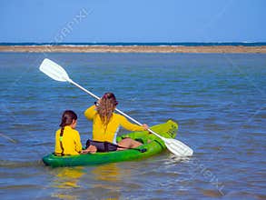 Mother and daughter in kayak