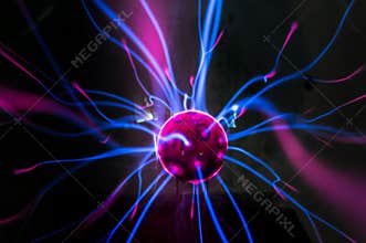 Plasma ball with magenta-blue flames