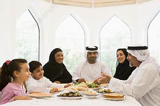 A Middle Eastern family enjoying