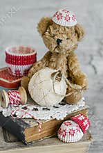 Decorative Christmas star, old books, paper molds for baking, toy bear