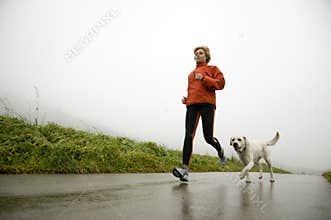 Road running with dog