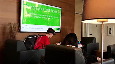 People sitting rest area and using cellphone