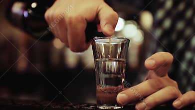 Preparation of alcoholic cocktail, close up