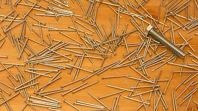 Small nails and a bolt