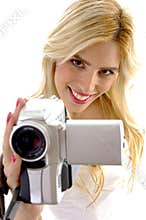 High angle view of happy woman with handy cam