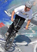 Biker during contest at summer urban festival