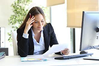 Businesswoman reading a document