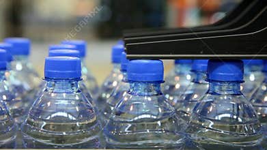 Many bottled water moves on conveyor belt