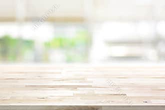 Wood table top on blur kitchen window background