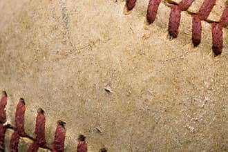 Softball with red stitching
