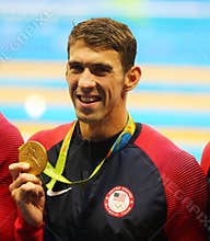 Olympic champion Michael Phelps of United States celebrates victory at the Men`s 4x100m medley relay of the Rio 2016
