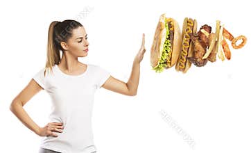 Beautiful woman saying NO to unhealthy food