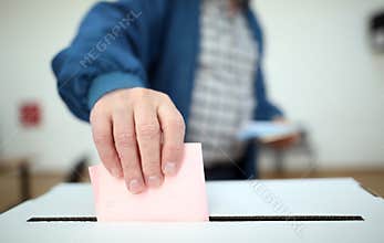 Man casts his ballot at elections