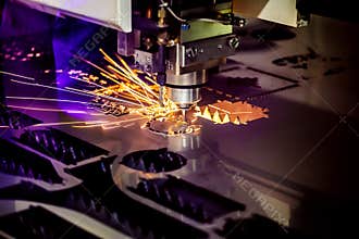 CNC Laser cutting of metal, modern industrial technology.
