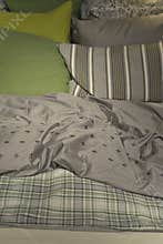 Comfortable looking bed with sheets