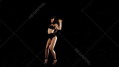 Young go-go dancer in the black
