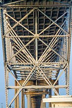 Intricate Geometric Patterns of Steel and Iron Works of the Underside of a Coastal Bowstring Bridge