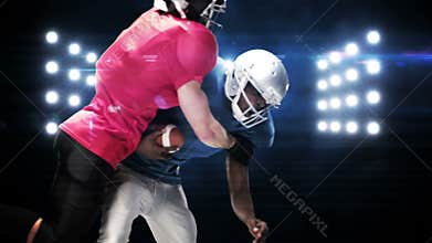 American football players against flashing lights