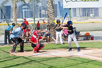 Kids playing baseball on Dubai fields,November 2015, UAE.