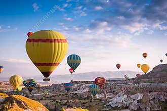 Hot air balloons fly over Cappadocia