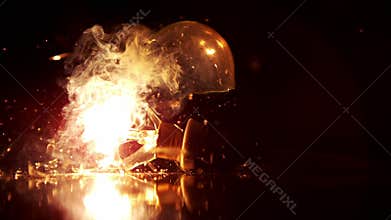 Light bulb dropping and smashing