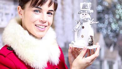 Christmas woman shopping snowman decoration