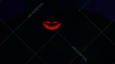 Woman face with fluorescent make up