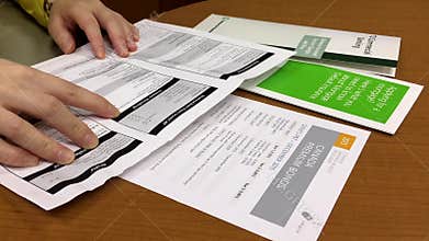Woman checking bank transaction fees
