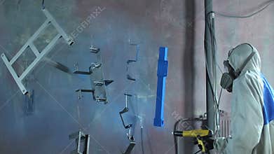 Powder coating of parts at the factory