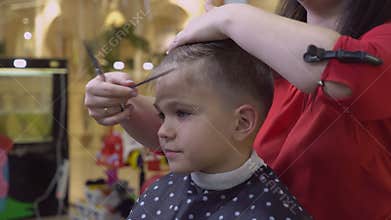 Kid in barbershop.