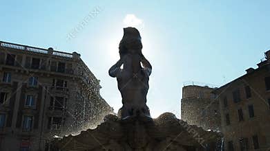 Triton Fountain Piazza Barberini Rome Italy backlit