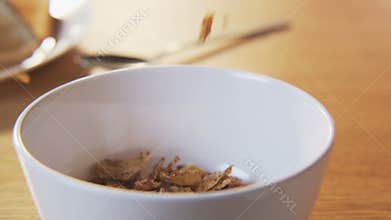 Putting Muesli Into a Bowl