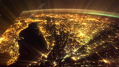 Shining Earth and Italy seen from ISS. Elements of this video furnished by NASA. Italy lit night lights