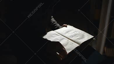 Dark Wizard is reading a book