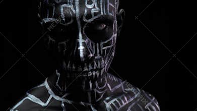 Athletic man with amazing body art, lines and symbols on his body and face