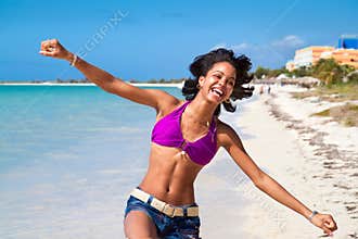 Beautiful caribbean woman dancing