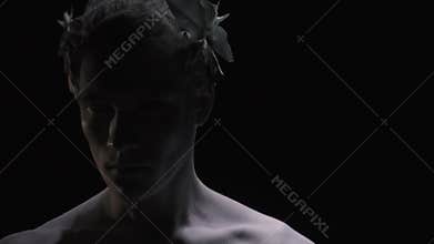 Young Caesar turns his head and looks at the camera