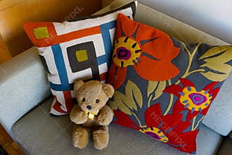 Bright, comfy throw pillow designs with bold orange accents