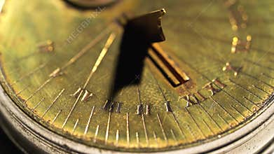 Dial of a solar watch on a white background. Close up