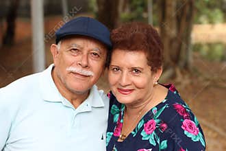 Tender older ethnic couple candid