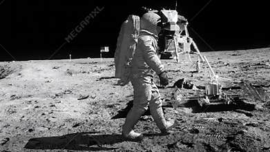 Astronaut walking on the moon.