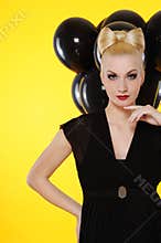 Lady with black balloons