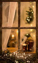 Romantic evening winter scene with old window