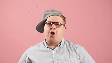 Funny man much similar to Winnie the Pooh with air balloons isolated over pink