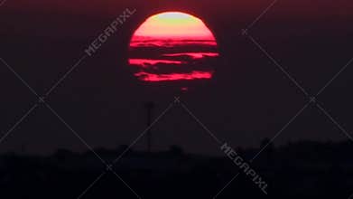 Orange-red sun on setting moments. Close up